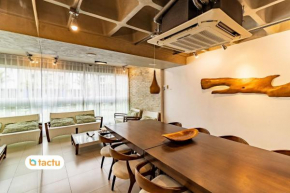 Apartamento térreo luxuoso perfeito para curtir as férias com estilo no Riviera Beach Place por Tactu